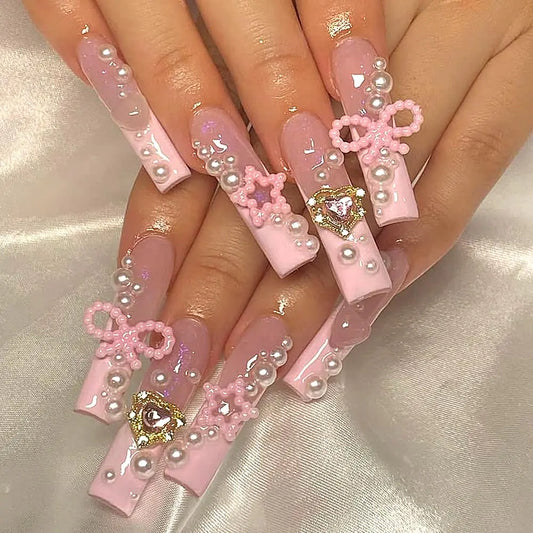 ElegantNails Pink French Tip Coffin Nails – Glamorous Charm Design